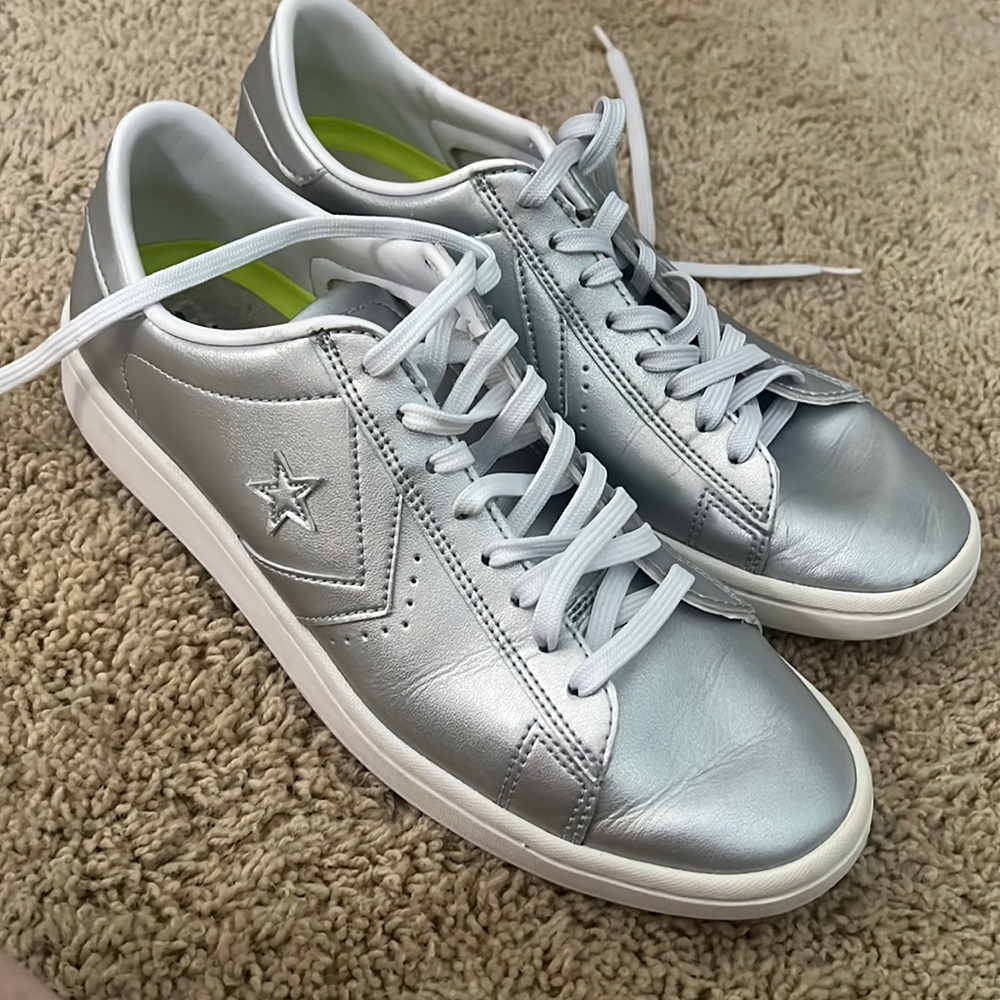 Women’s silver metallic converse. Size 8.5.